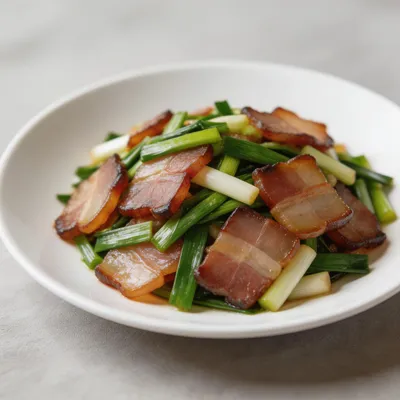 Suan Miao Chao La Rou — Garlic Sprouts with Cured Pork